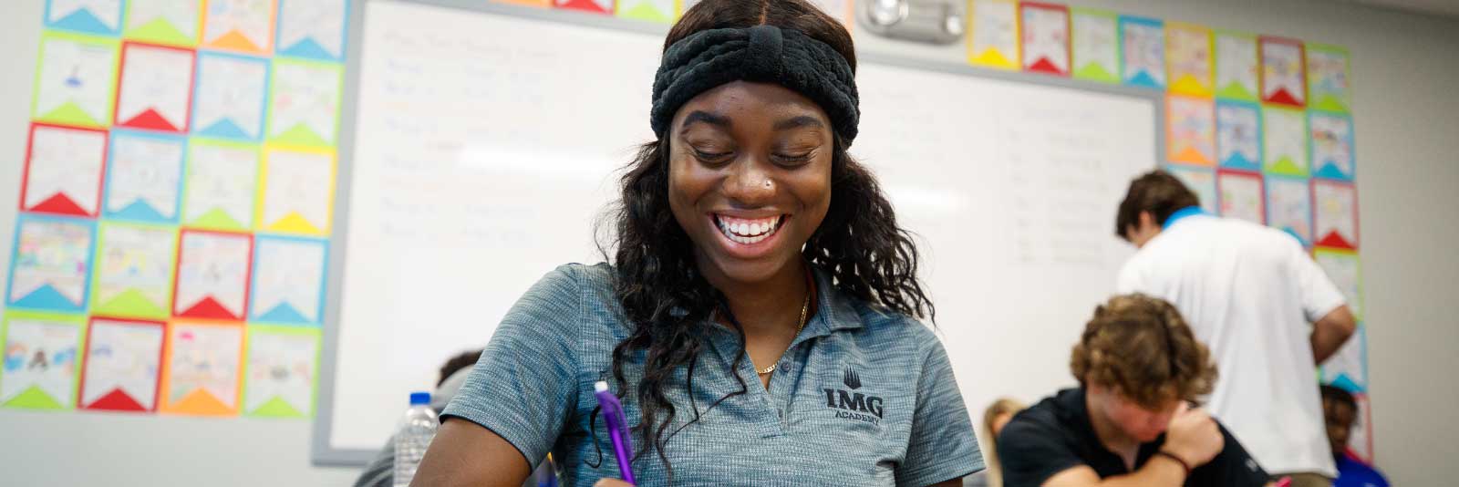 IMG student-athlete in classroom