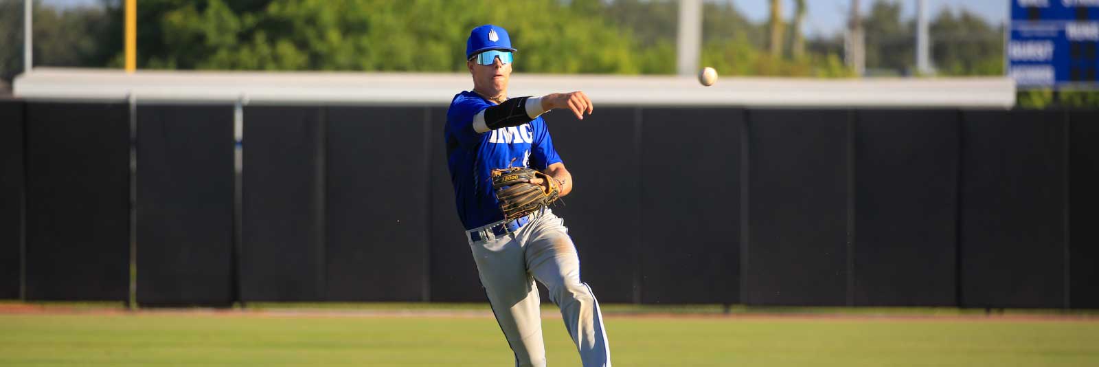 IMG baseball player throwing ball