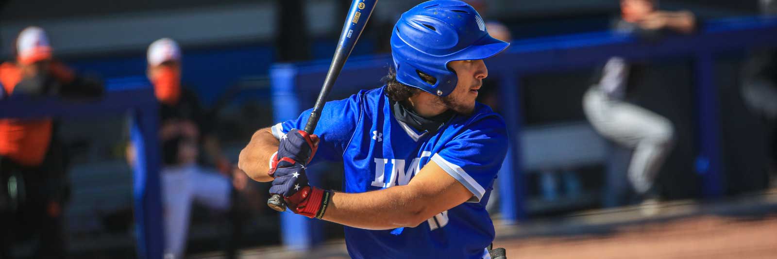 IMG baseball player holding bat