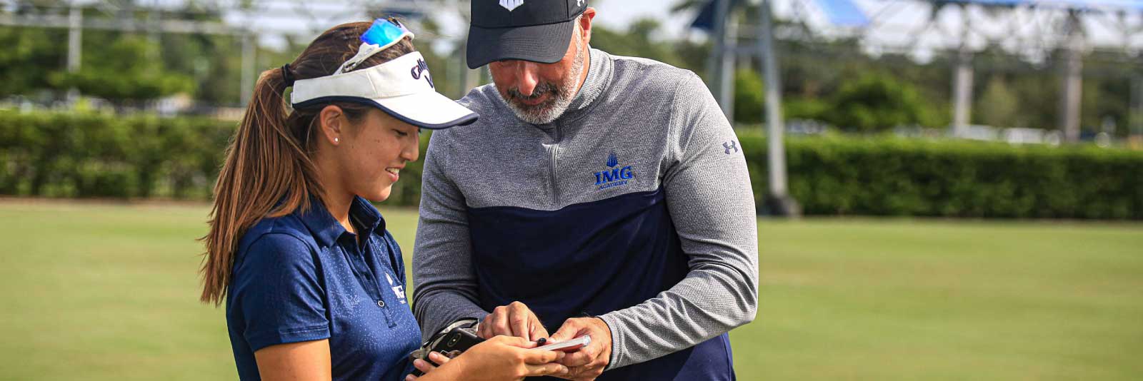 women's golf coach and athlete