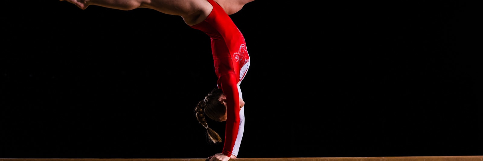 woman on a balance beam