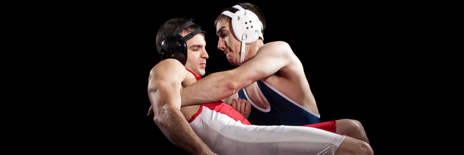 two male wrestling athletes