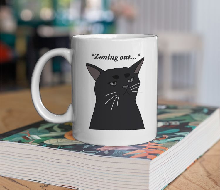 Zoning out cat Coffee Mug