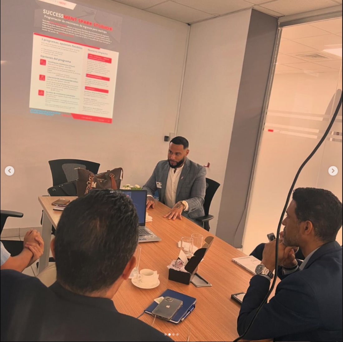 Successment advisory session with participants seated around a conference table