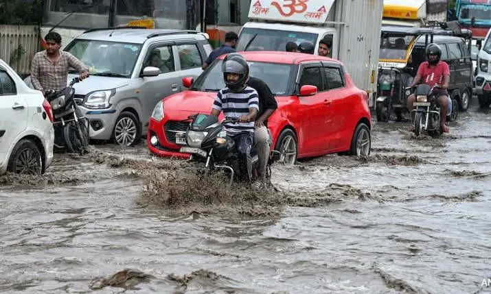 Delhi Rain Alert Today: IMD Issues Red Alert as Heavy Rain Disrupts Traffic Across NCR