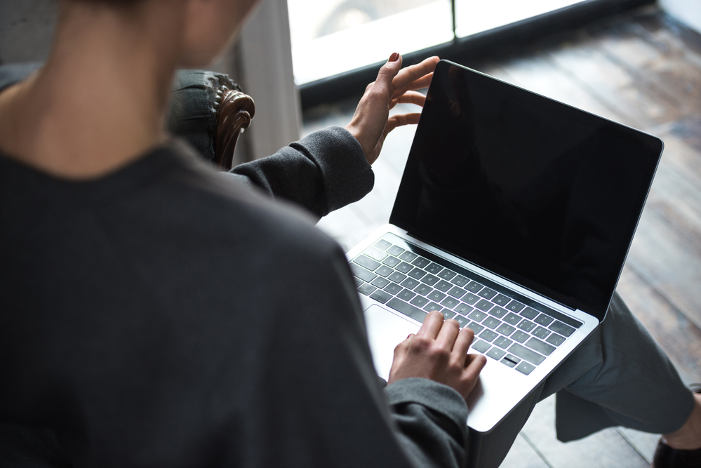 woman using laptop