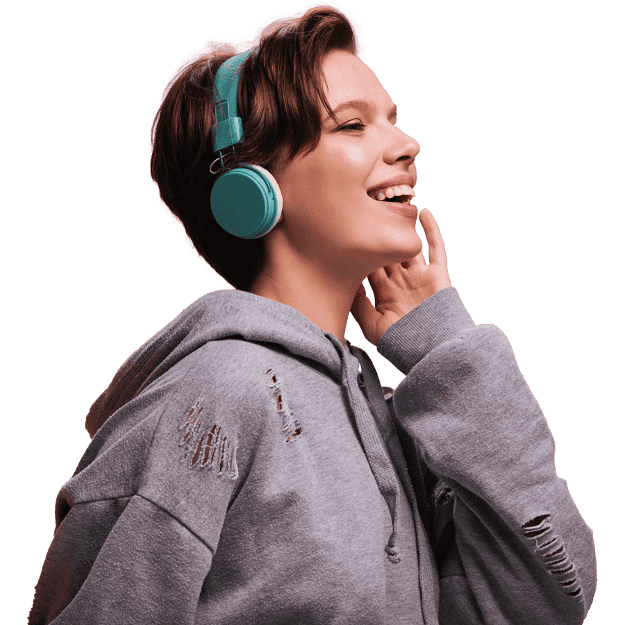 Person with headphones smiling