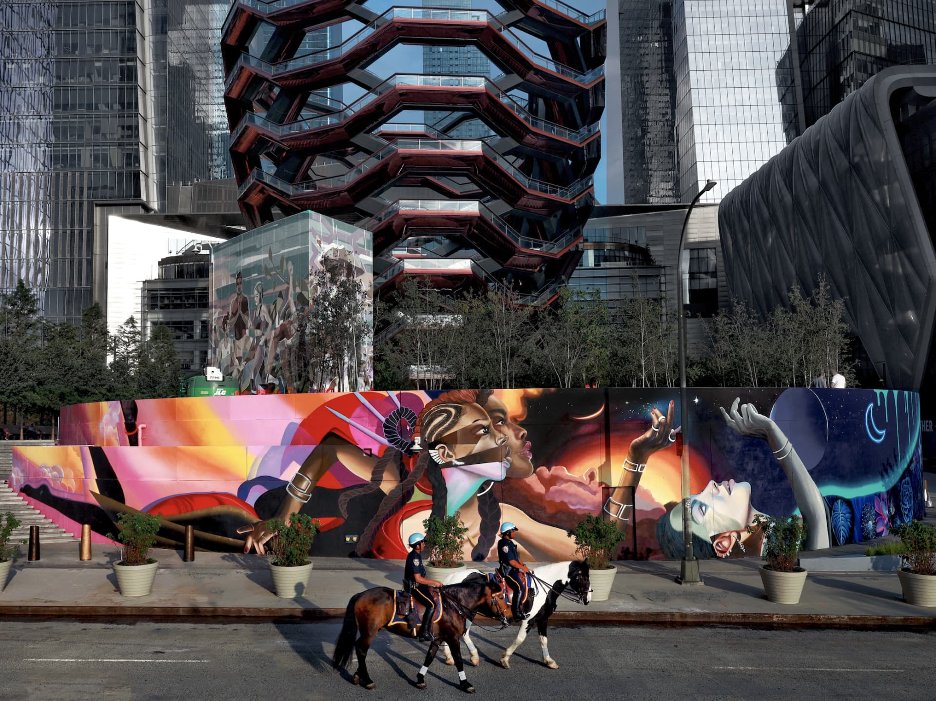 Cosmic Embrace in Urban Landscape by Elle