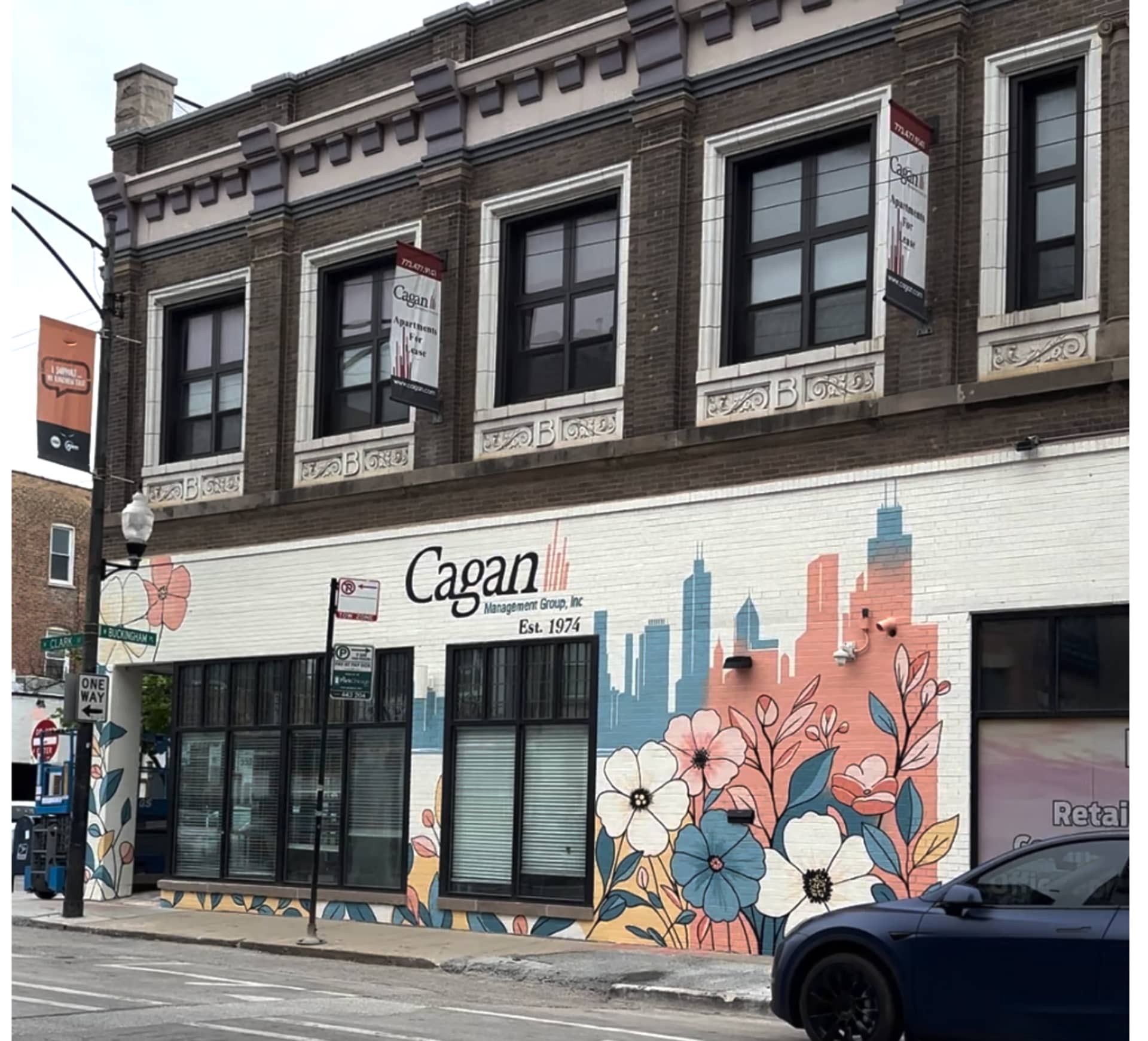 Clark Street Mural (Assistant - I painted in several flowers & backgorund) by Emma Sarran
