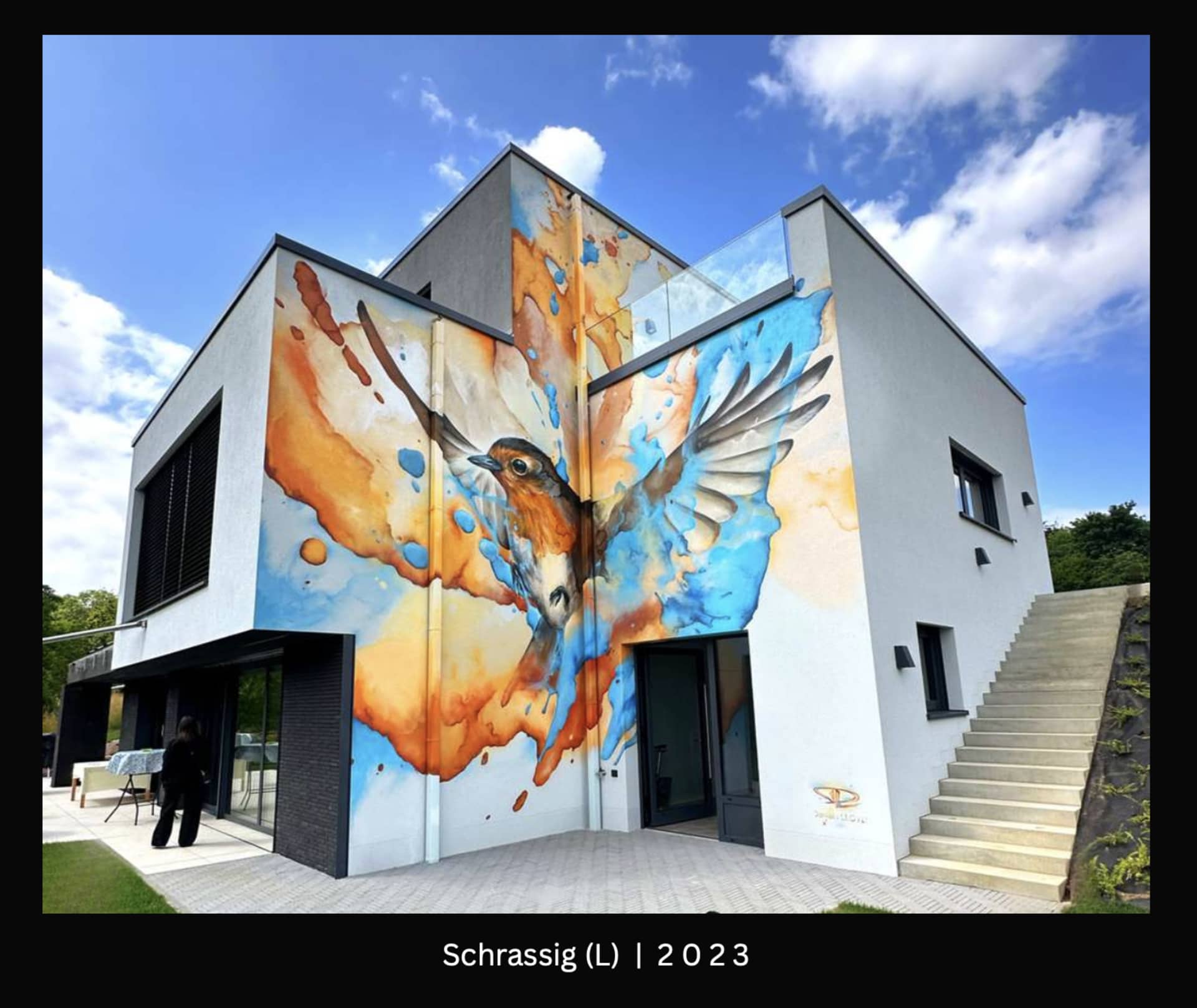 Wings of Colorful Freedom in Urban Space by Daniel Mac LLOYD