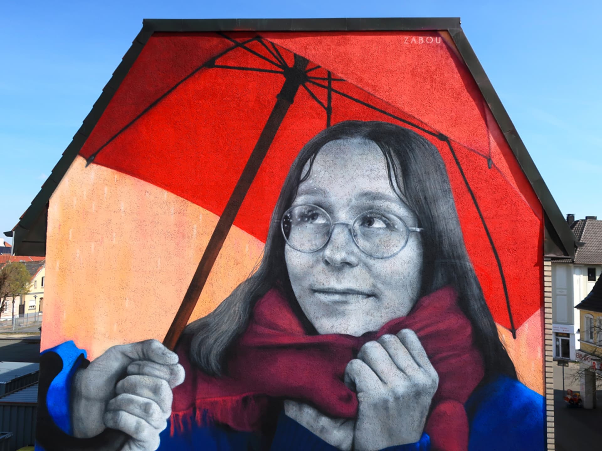 Embracing Color Under a Red Umbrella by Zabou