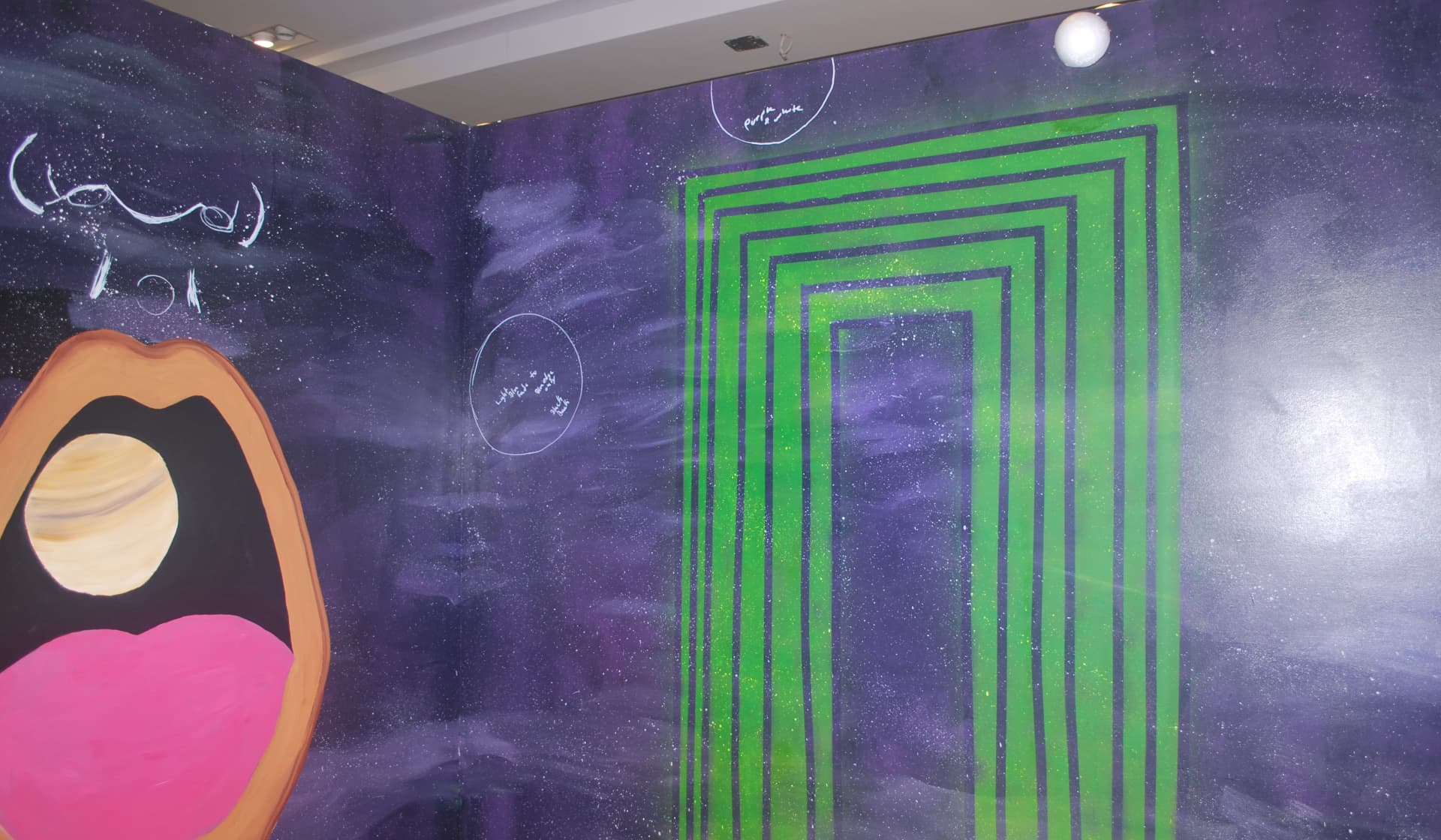 recently painted over but this was a entire room painted like outer space with blue light 