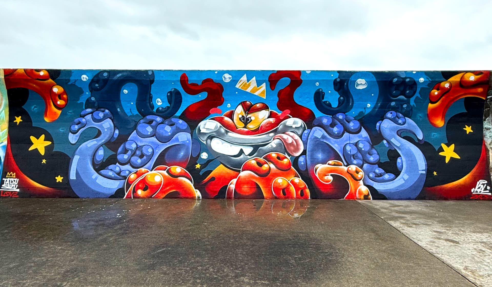 Crowned Character Amid Tentacles and Fire