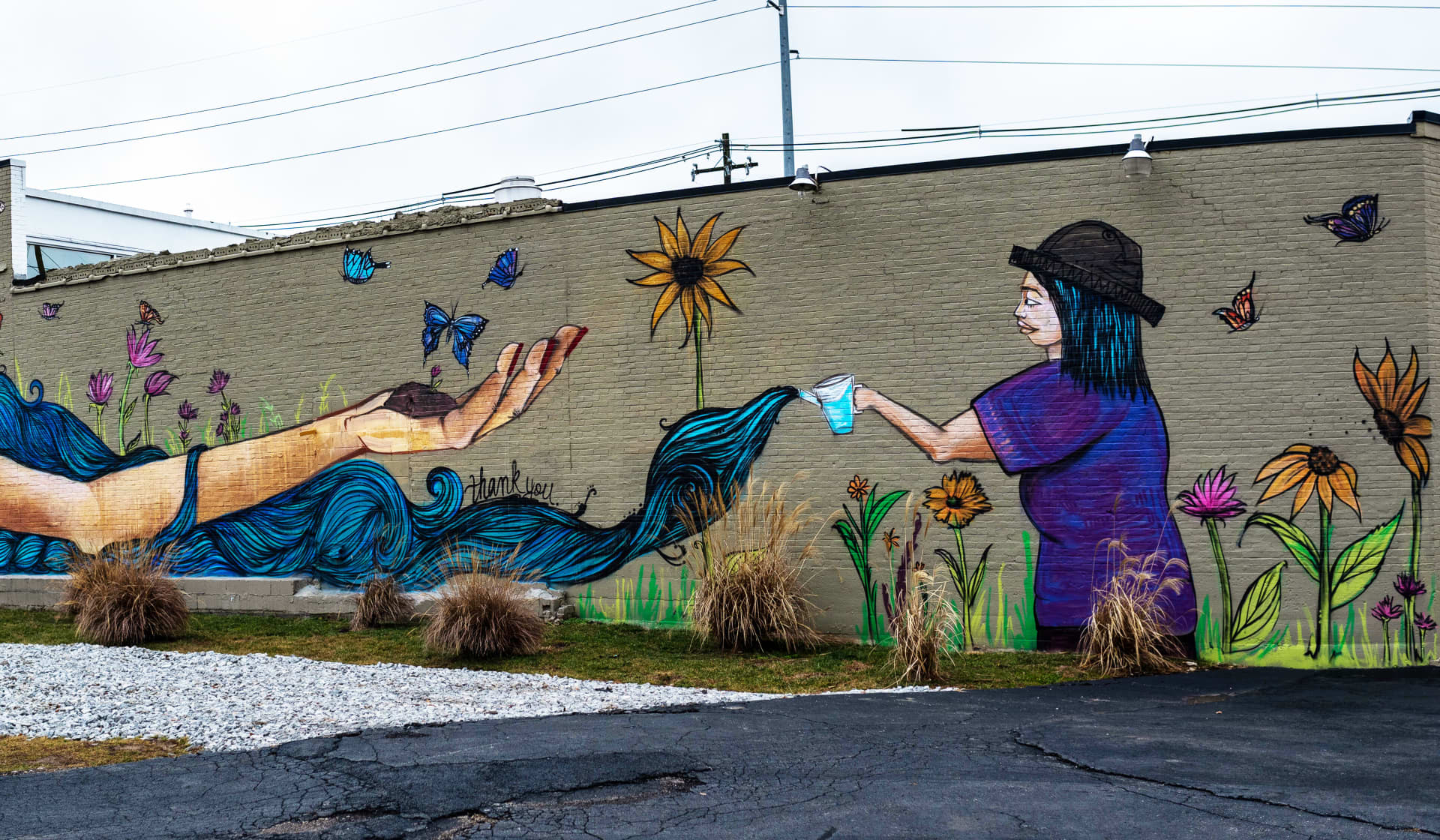 Nurturing Nature's Embrace Through Colorful Hands
