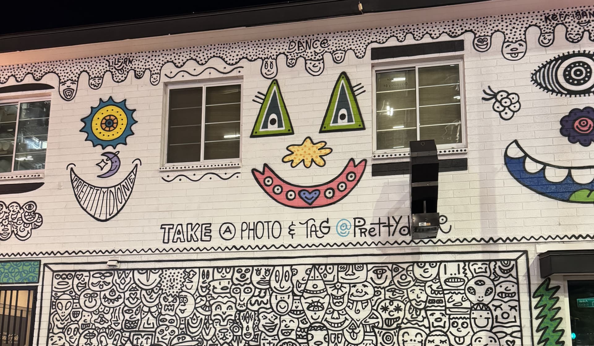 Whimsical Faces in a Playful Urban Dance