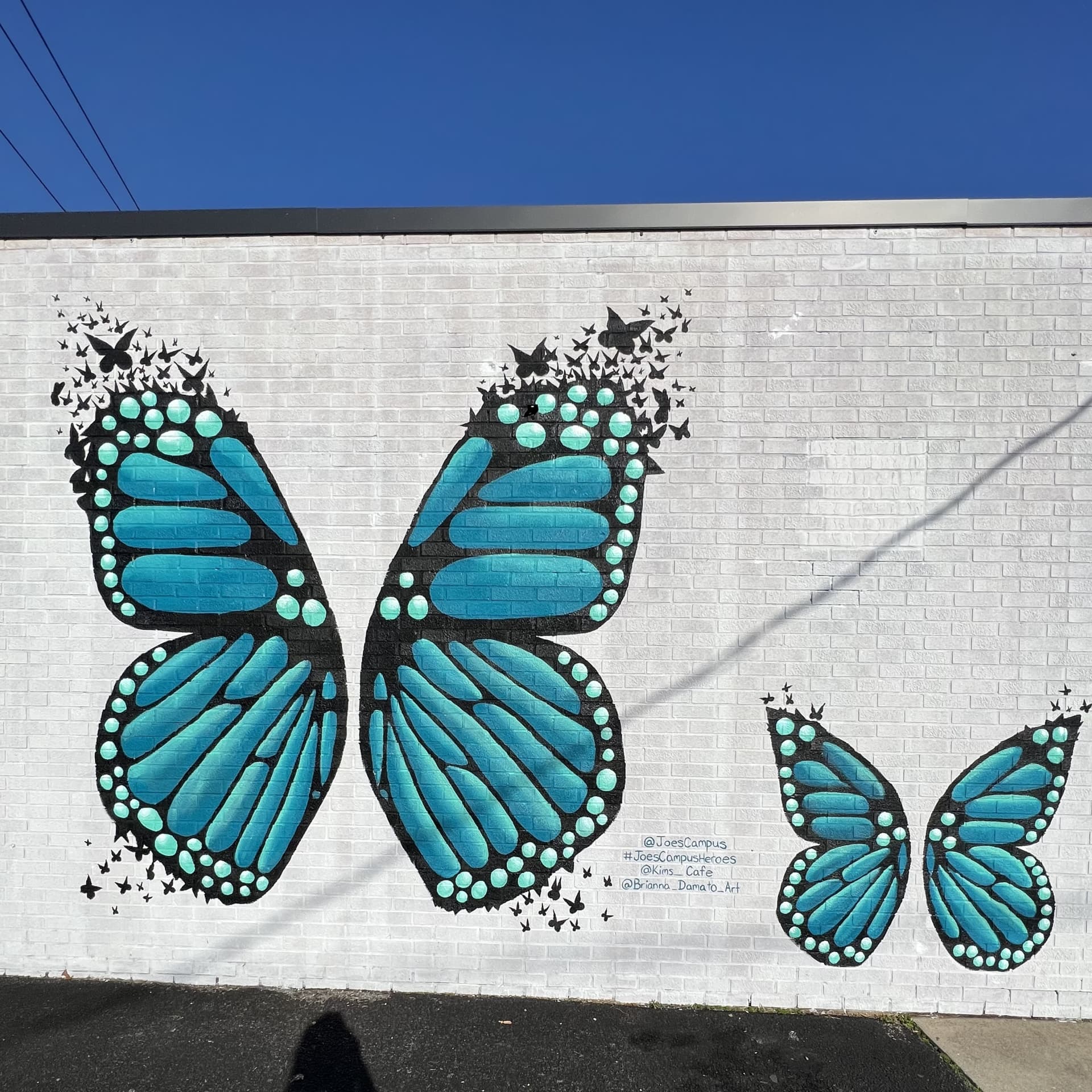 Wings of Transformation in Vibrant Blue detail