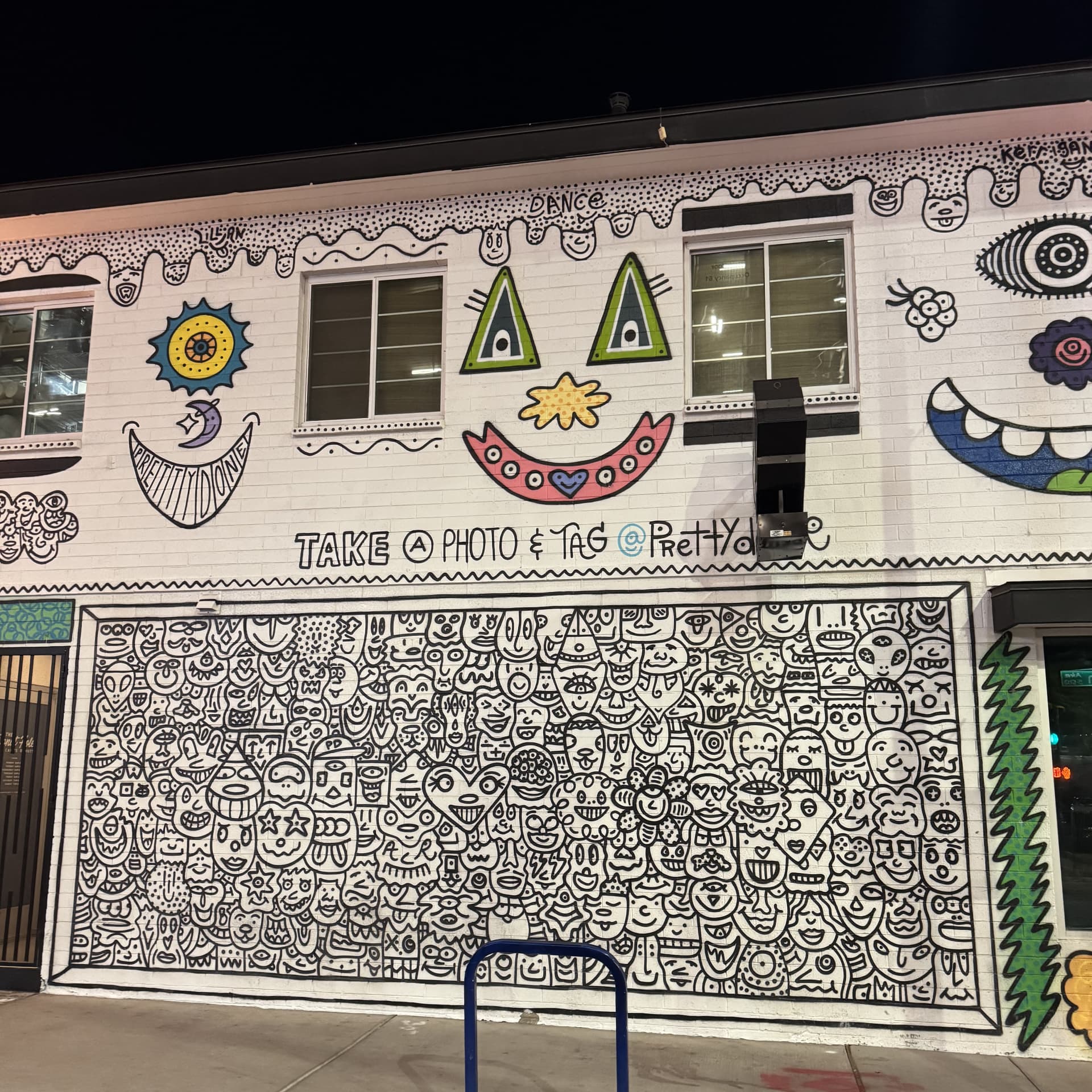 Whimsical Faces in a Playful Urban Dance detail