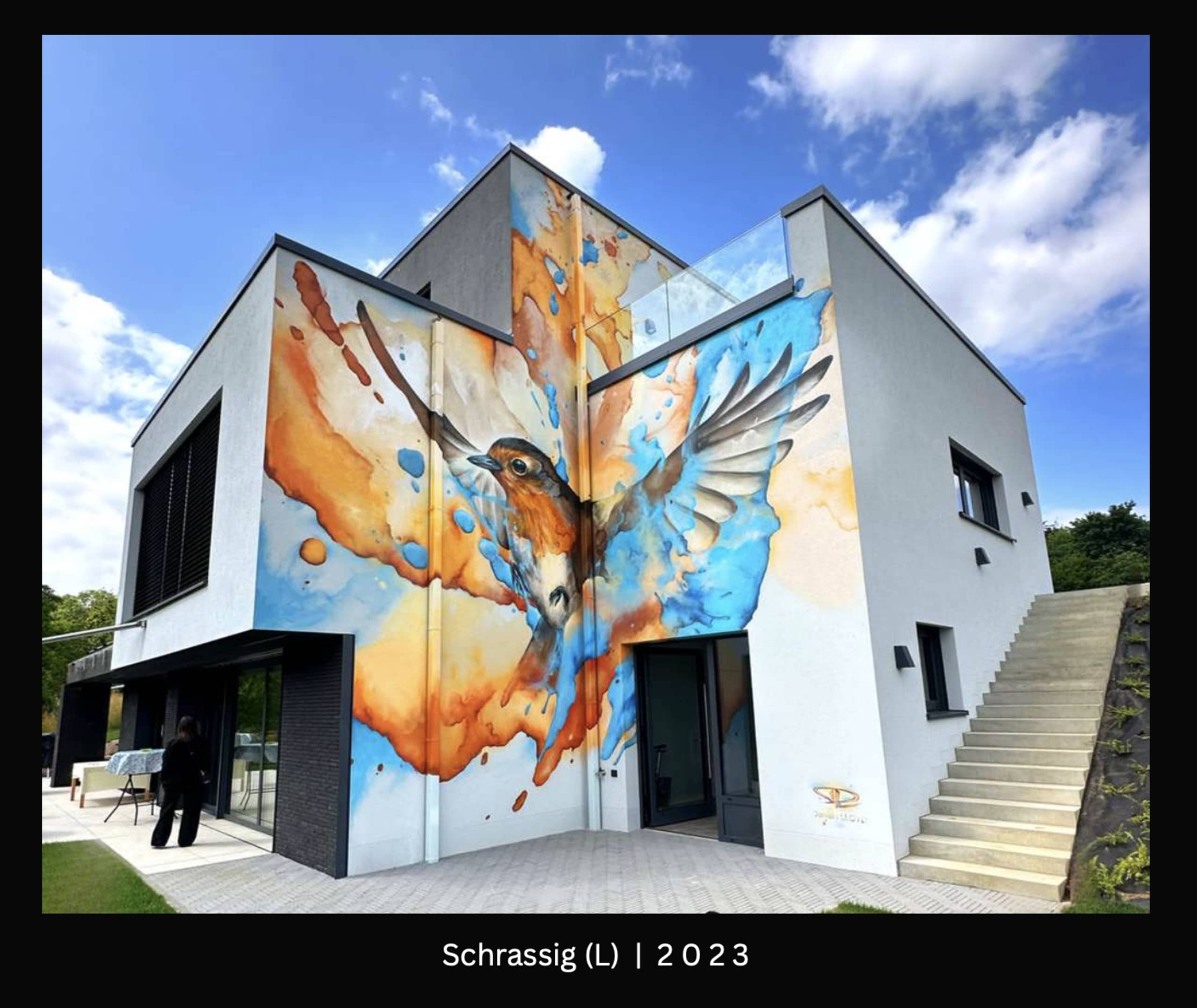 Wings of Colorful Freedom in Urban Space by Daniel Mac LLOYD