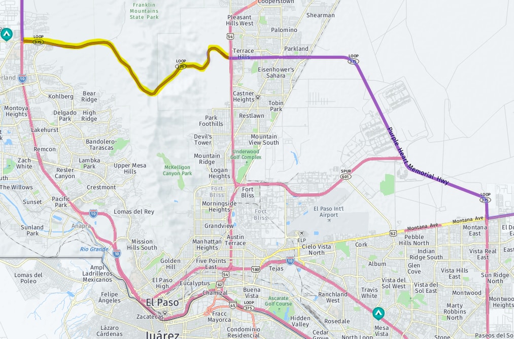 A map of El Paso. North of El Paso is a highlighted section of road called Loop 375, which cuts across a mountain in the Franklin Mountains State Park to access I10