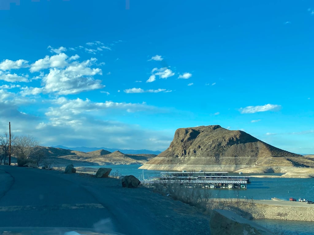 View of the Elephant butte, shooting out of the water in New Mexico. The rock formation looks somewhat like an elephant laying down.