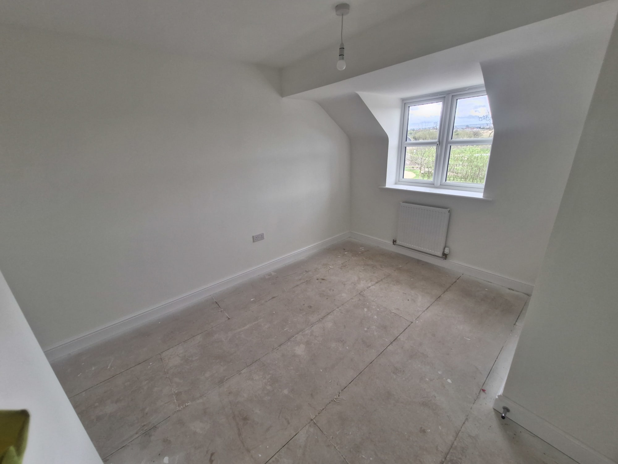 Empty new build room — before AI design