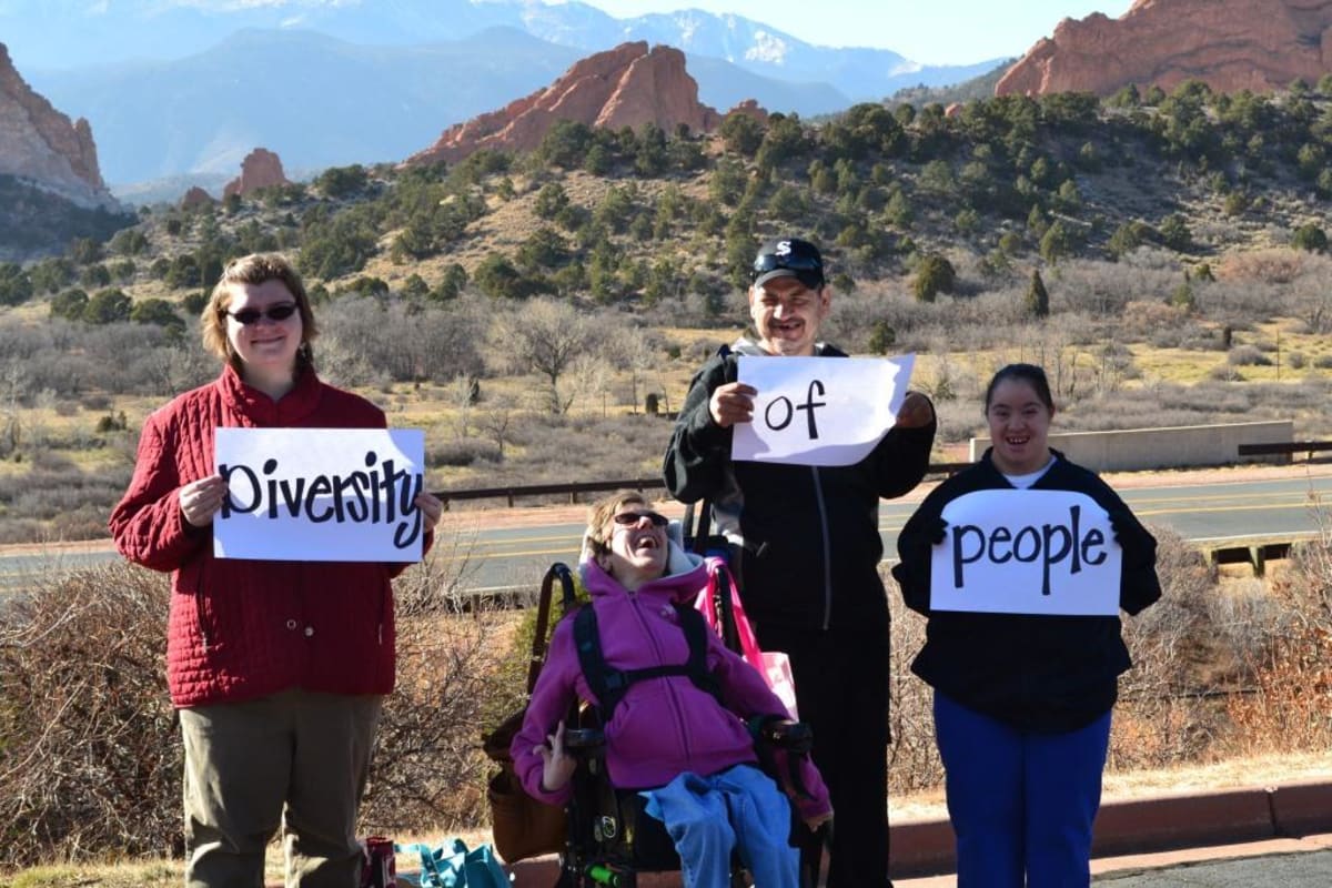 Diverse community members with and without disabilities together