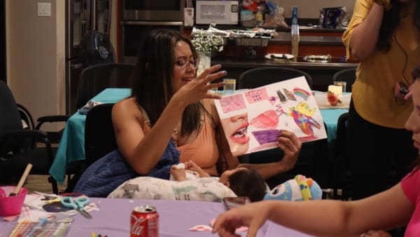 Parents creating art together at a Spanish Parent Empowerment Through Art session