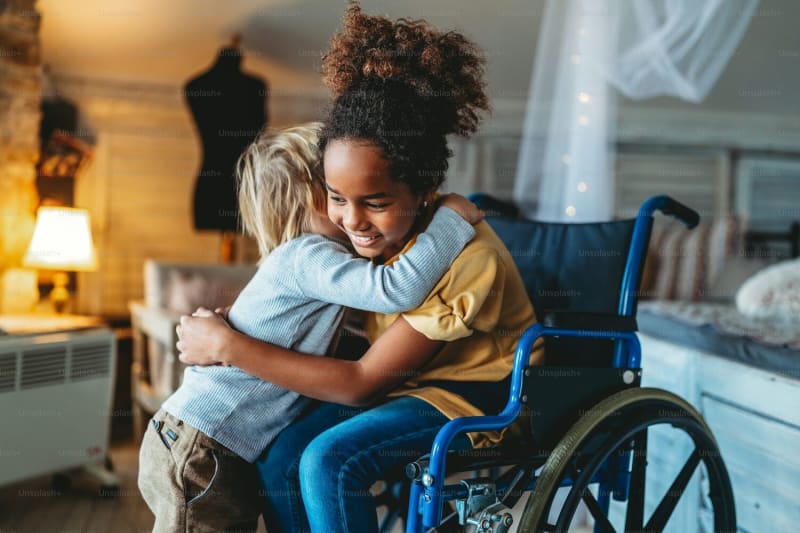 A family with a child who has a disability sharing a warm moment together