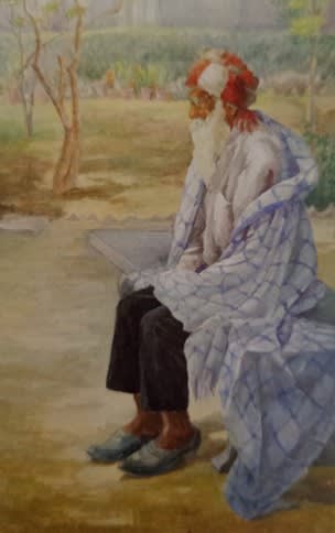 Old Man Sitting on a Park Bench