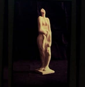 Bather holding towel