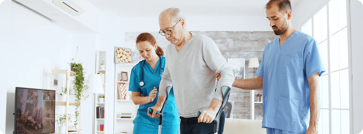 Physical therapist assisting senior patient with neurological rehabilitation