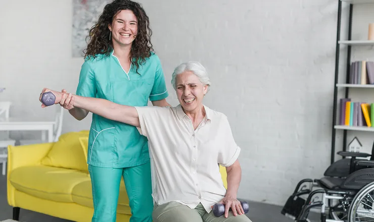 Physical therapist assisting senior patient with neurological rehabilitation