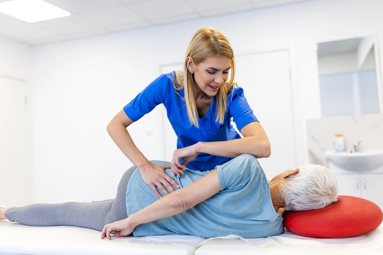 Woman experiencing sciatica and lower back pain