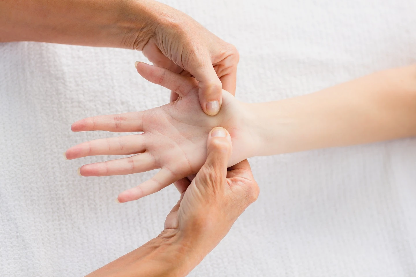 Hand therapist treating a patient's hand