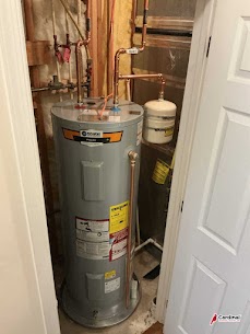 A clean, professionally installed water heater highlights reliability and care from Cardinal Plumbing Heating & Air Inc for your home.