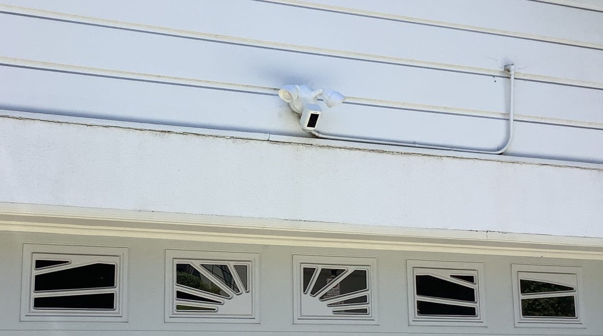 Powell Electric installed a clean, professional exterior light and camera setup to enhance home safety and curb appeal.