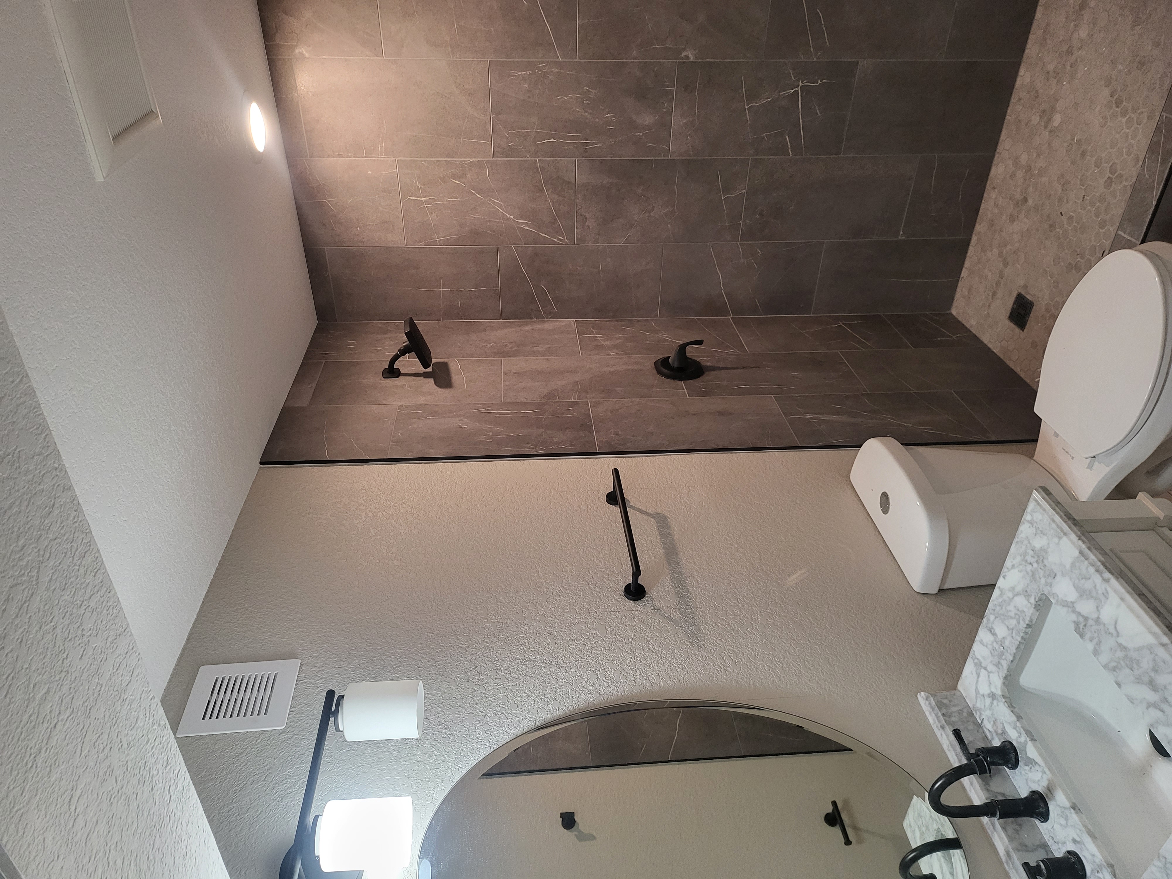 Elevate your home's elegance with Next Level Pros' expert bathroom renovation services.
