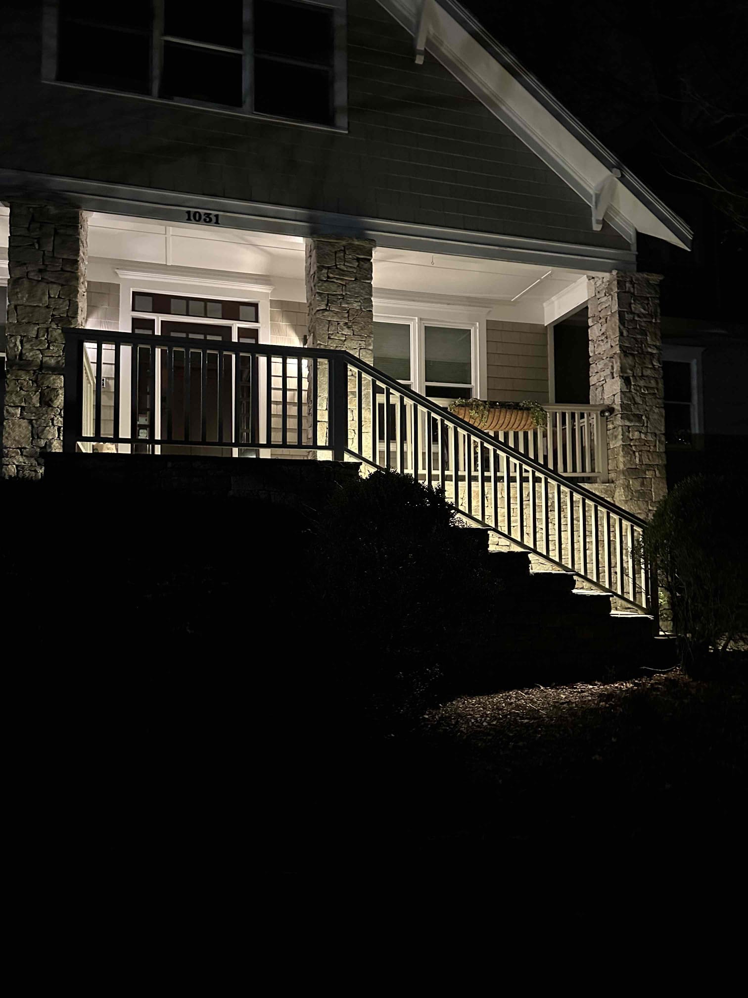 Transform your home's exterior with expert lighting solutions by Aardvark Electric, Inc. for safety and style, day or night.