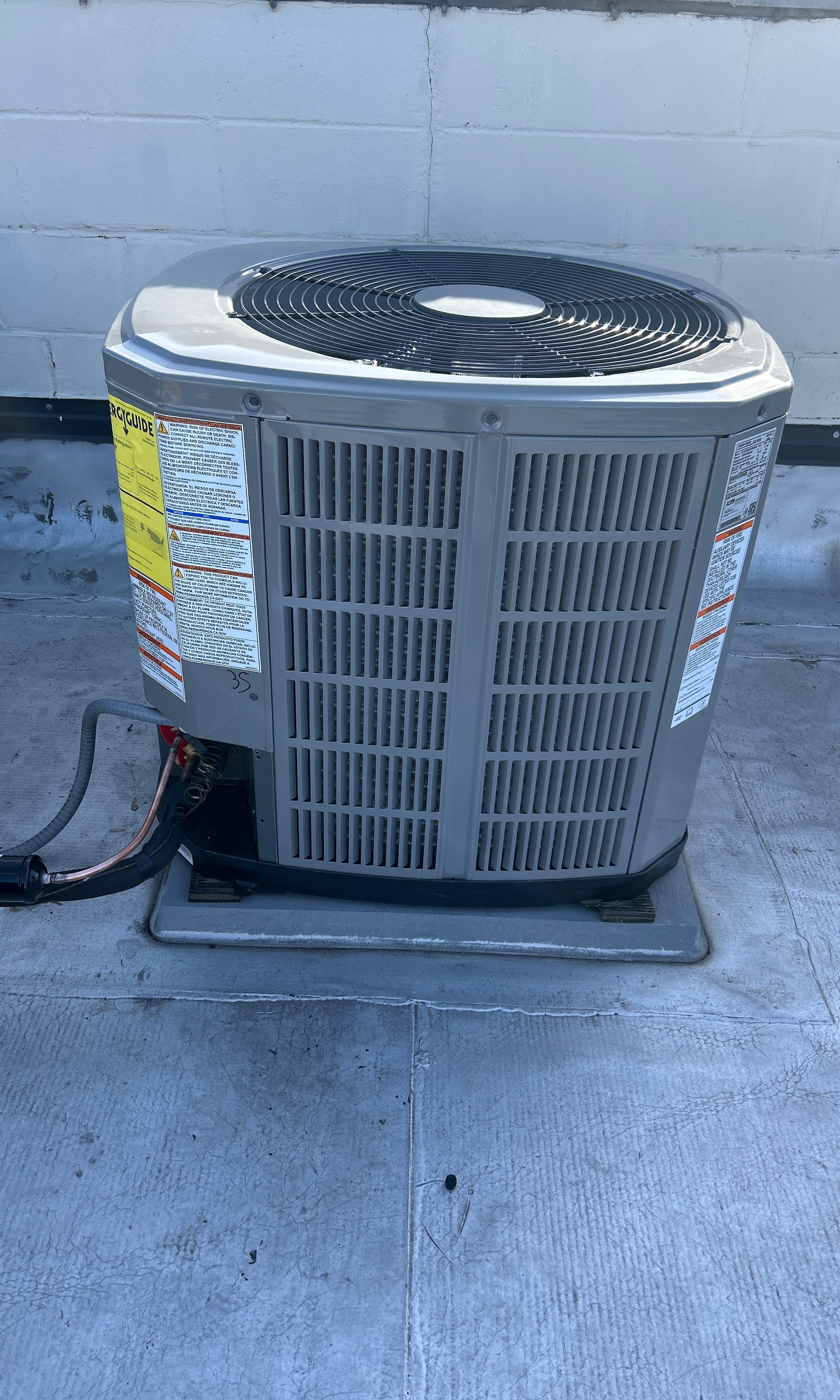 A well cared for rooftop air conditioner shows the craftsmanship homeowners trust from Oasis Heating and Cooling, ensuring reliable comfort.