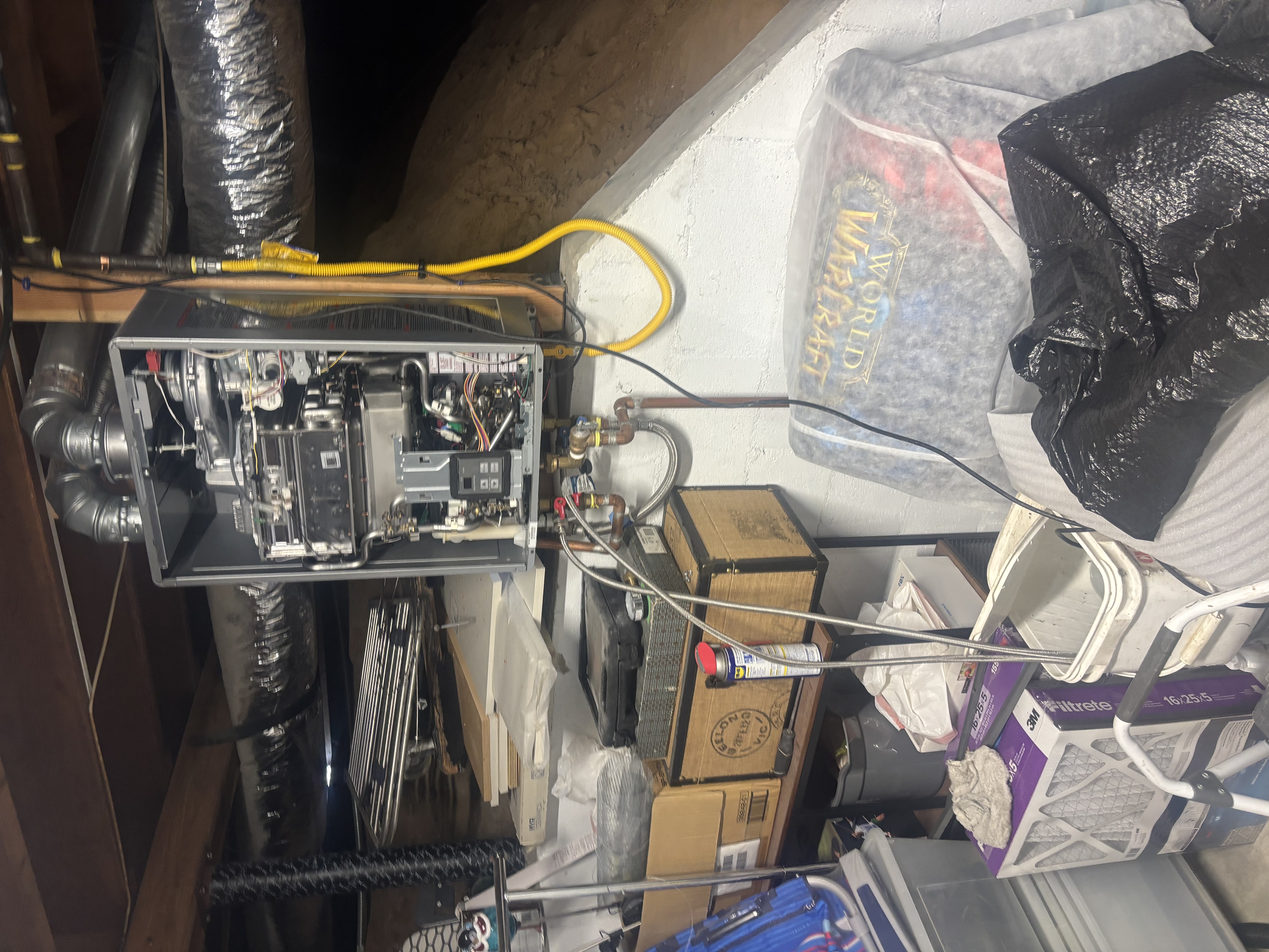 Confident, careful installation and service in tight basement spaces shows why homeowners trust Island Plumbing for reliable hot water solutions.