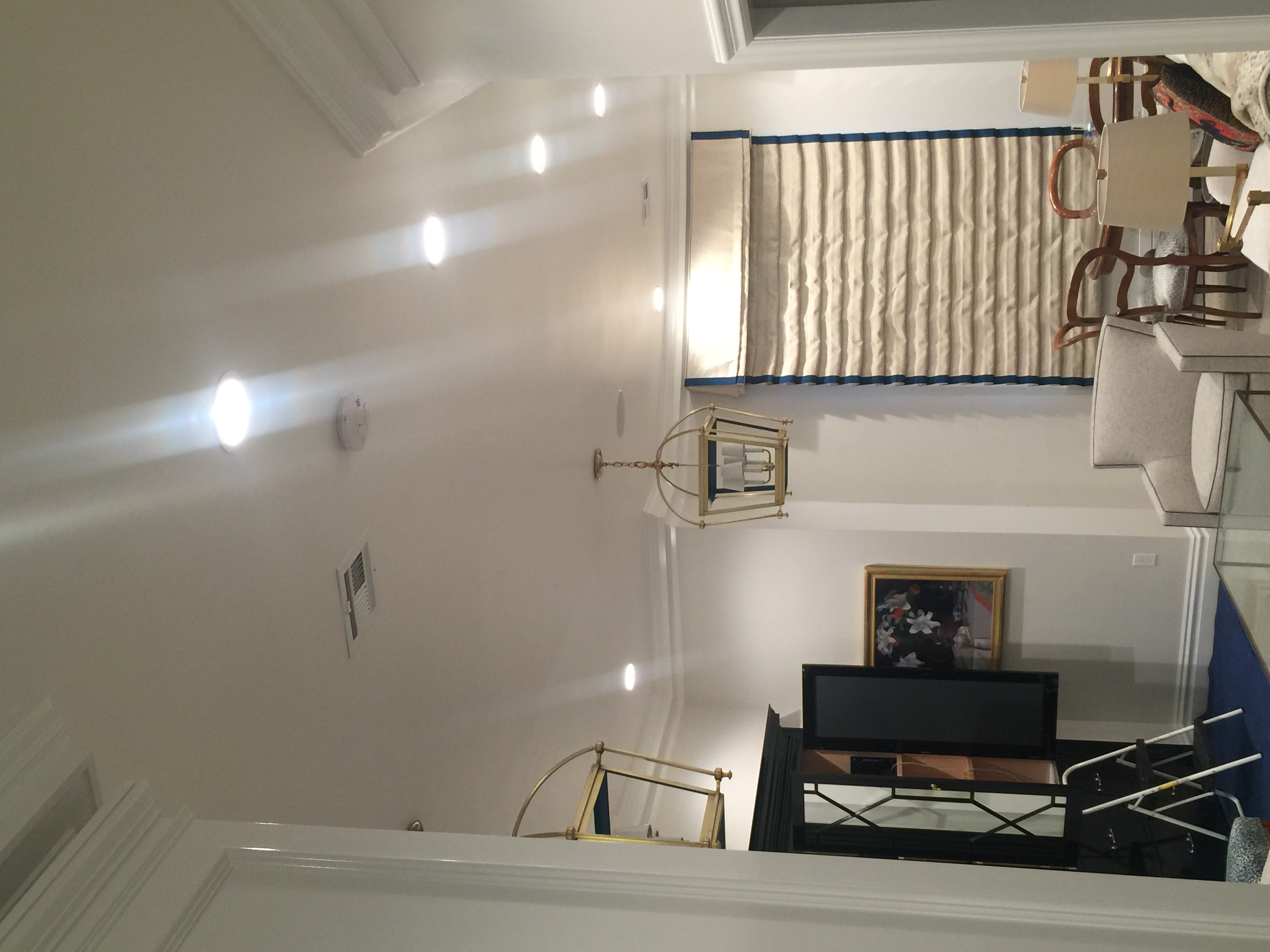 Enhance your living space with expertly installed lighting by Castle Electric Inc., where quality meets elegance.