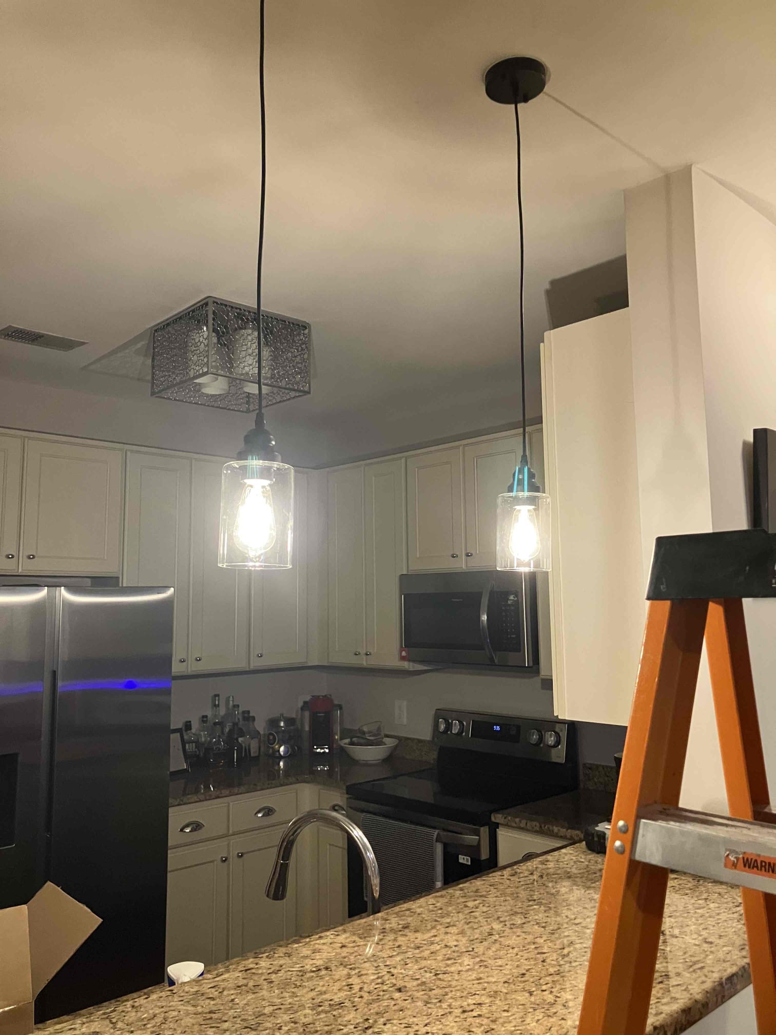 Bright, carefully installed pendant lighting showcases the craftsmanship homeowners trust from Dawson's Electric & Air.