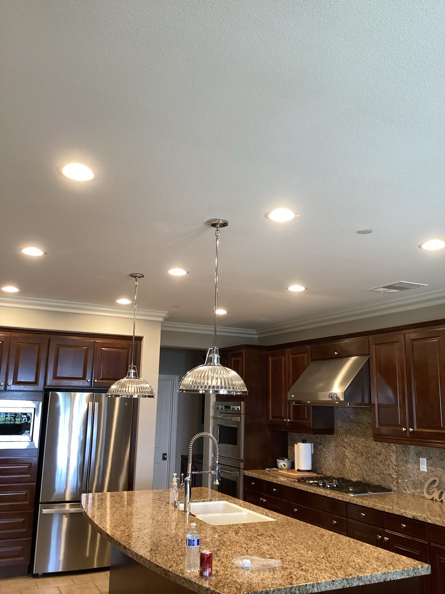 Powell Electric delivers clean, professional kitchen lighting installations that enhance safety and showcase fine craftsmanship.
