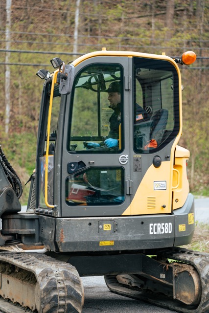 Reliable site equipment and trained operators show Lloyd Plumbing, Heating, Air, Electrical ready to handle tough outdoor utility jobs with care.