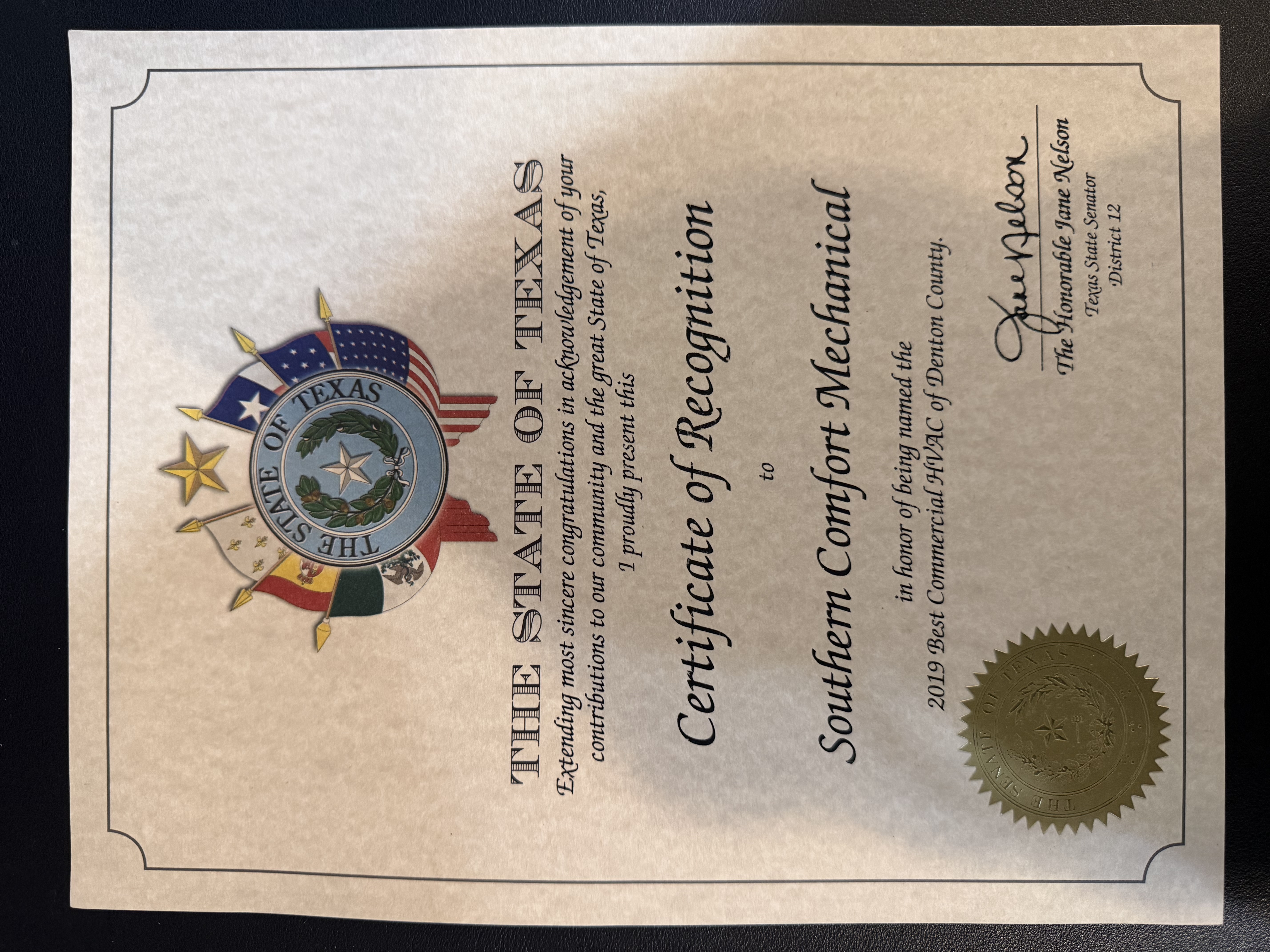 A framed certificate recognizing Southern Comfort Mechanical underscores our professionalism and trusted craftsmanship, reinforcing value to customers.