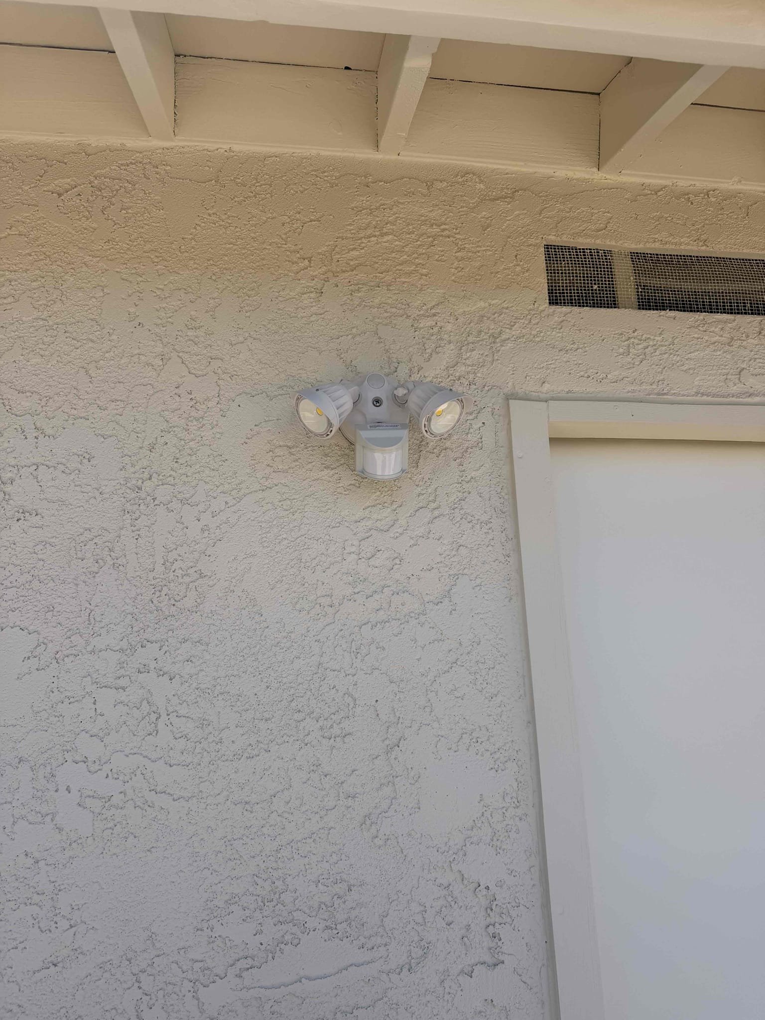 Powell Electric installed a clean, efficient motion-sensor floodlight to improve nighttime safety and curbside visibility.