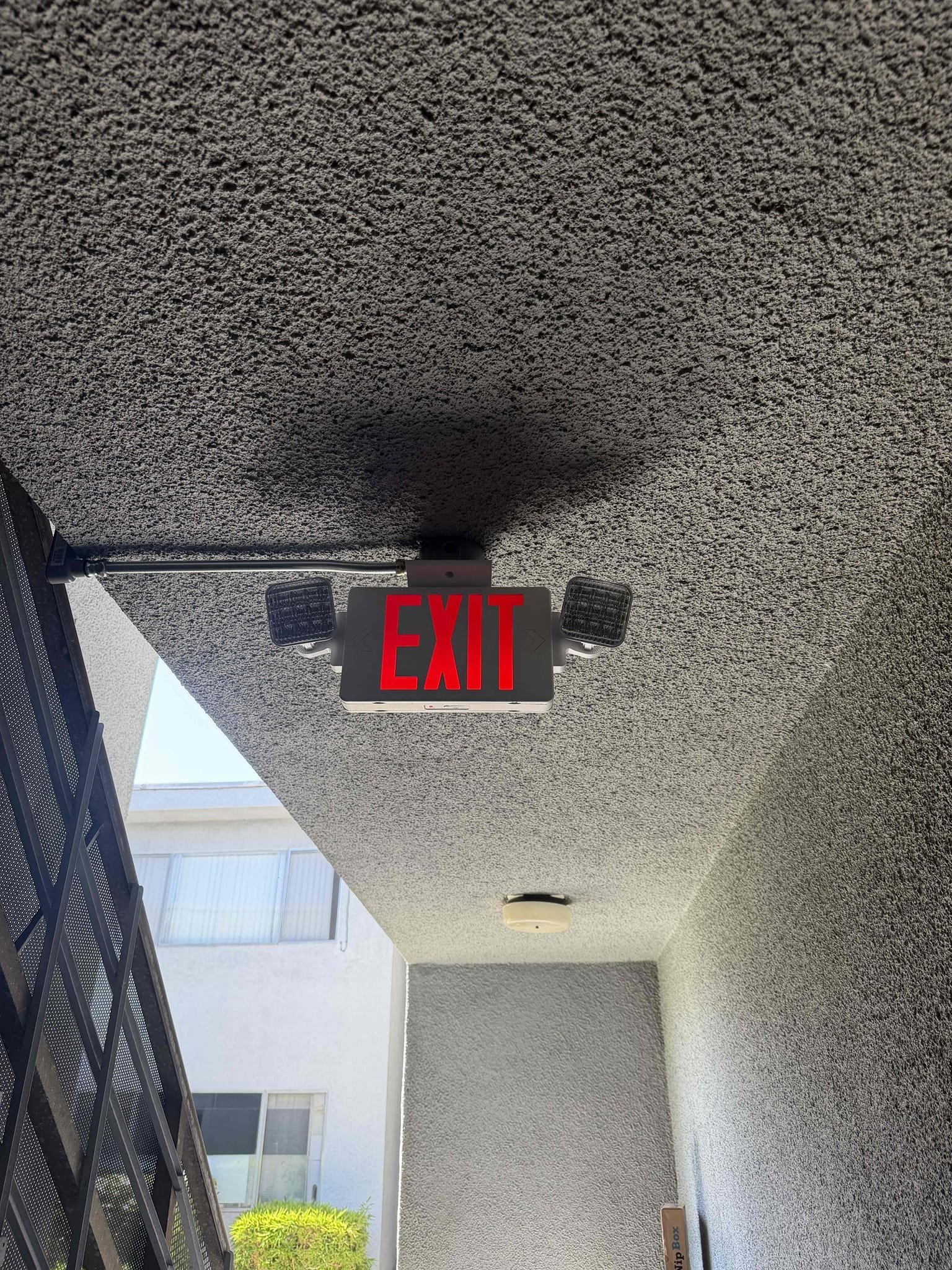 Visible, well-maintained emergency lighting and signage show Powell Electric’s commitment to reliable, safety-first electrical work.