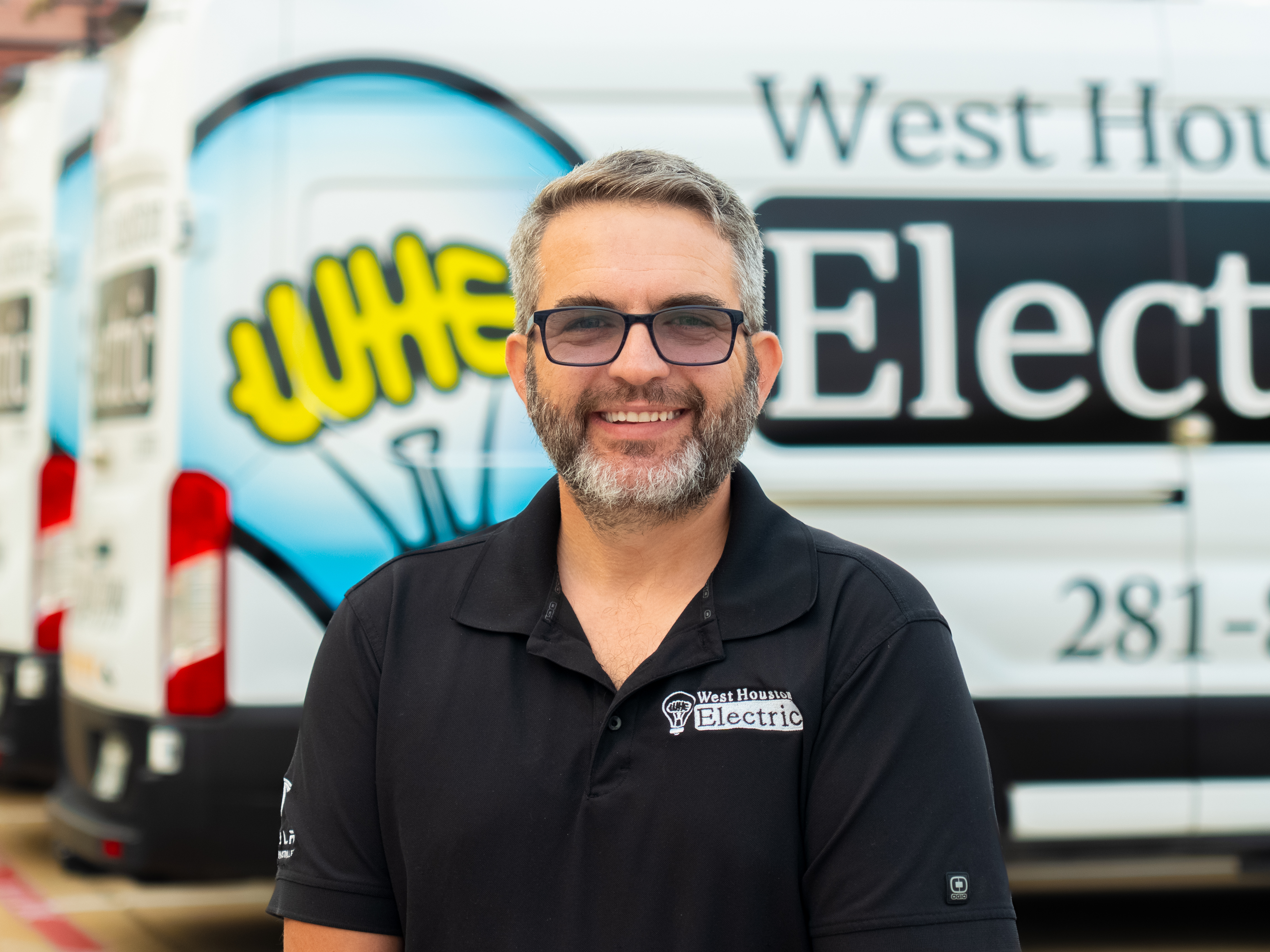 A friendly, professional technician from West Houston Electric, Inc. showcases the reliable service and trust customers expect.