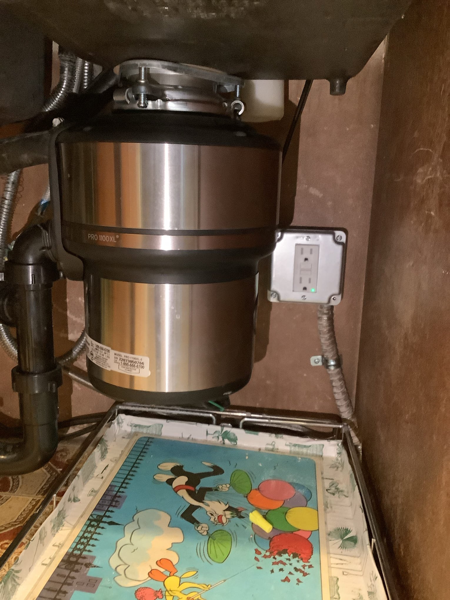 Powell Electric installed a safe, neatly mounted garbage disposal and protected GFCI outlet to give homeowners lasting reliability and peace of mind.