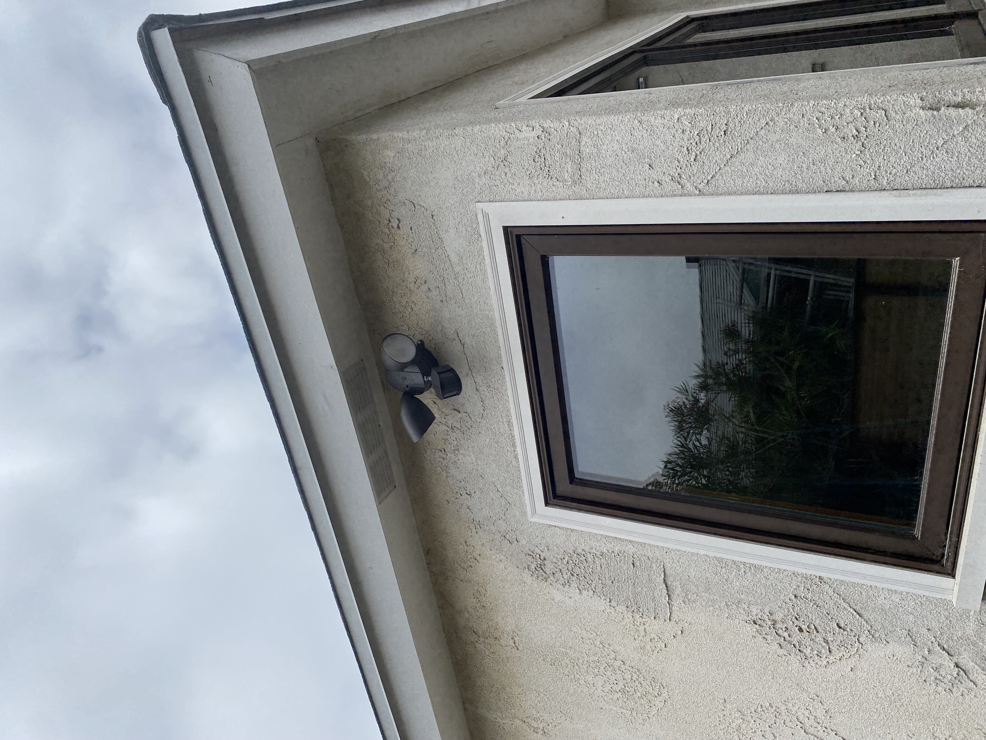 Powell Electric installed a tidy exterior motion light that boosts home safety and looks professionally finished.